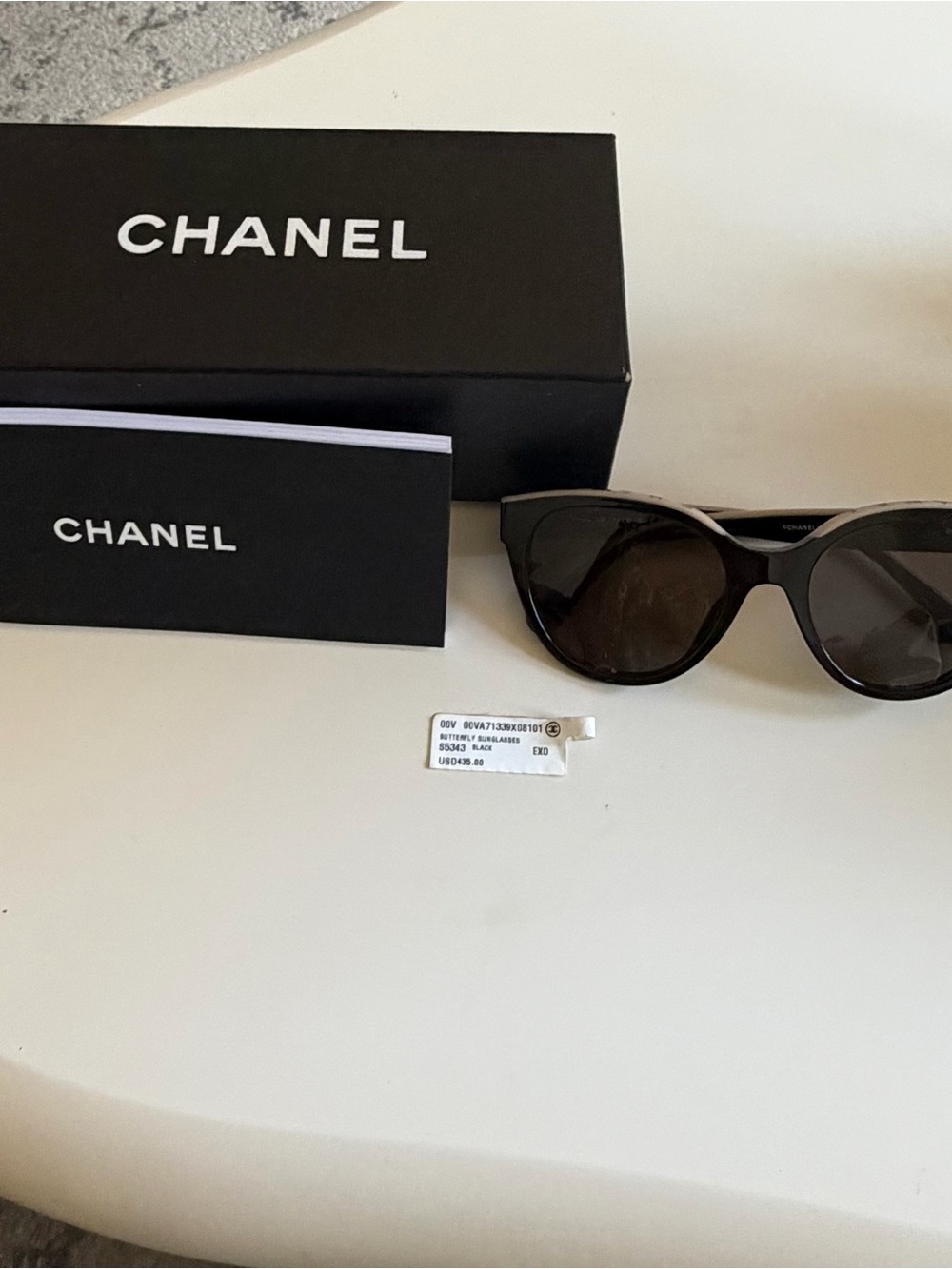 CHANEL Black Round Sunglasses with Silver CC Accent